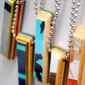 recycled skateboard, wood necklaces